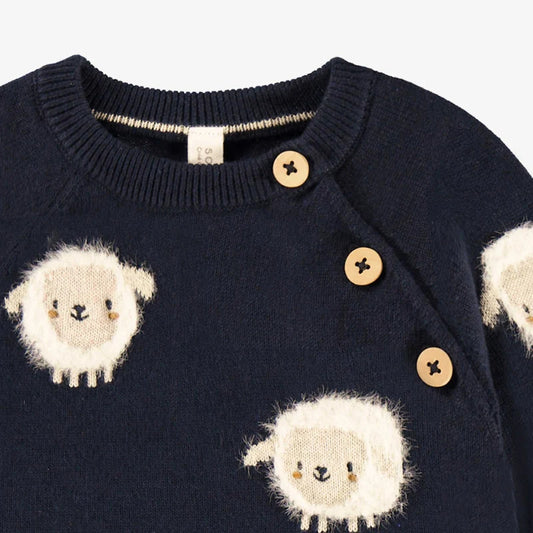 Navy blue knit sweater with sheep